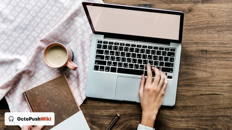 Woman typing on a laptop beside a notebook and coffee, illustrating a brumeblog com review