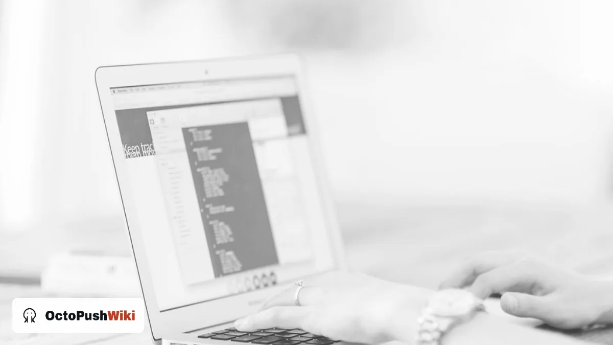 Person using a laptop to read a technology blog, illustrating a Droven io review