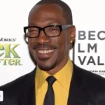 Eddie Murphy smiling at the 2010 Tribeca Film Festival, subject of this Eddie Murphy net worth profile