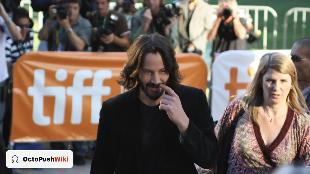 Keanu Reeves on the red carpet at the Toronto International Film Festival, illustrating Keanu Reeves net worth