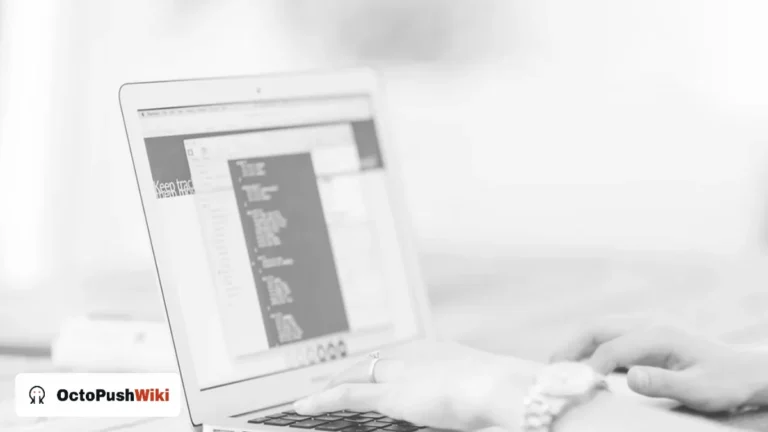 Person typing on a laptop, illustrating LLM meaning and AI language models